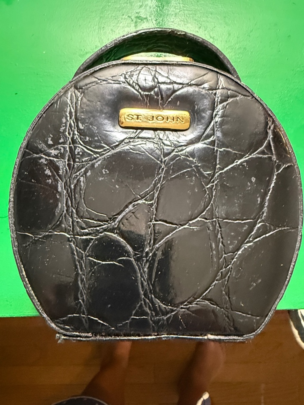 St. John Black Textured Round Vanity Case with Gold Plaque
